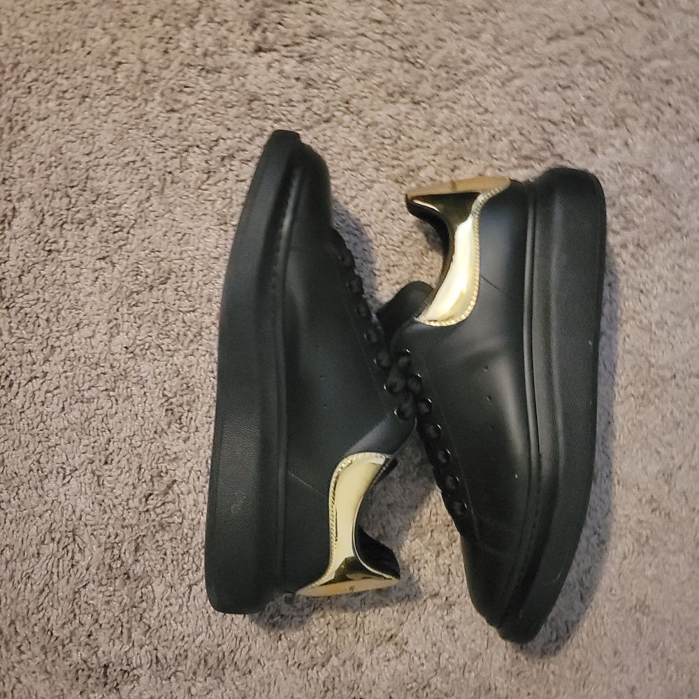 Alexander McQueen Men's Sneakers in Black and Gold